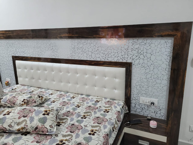 Bed With Stylish Wall
